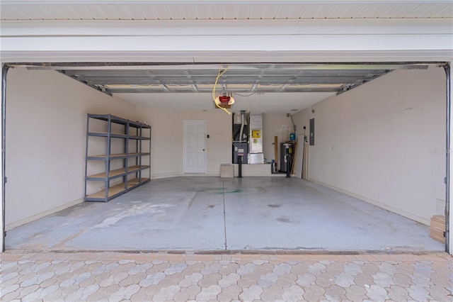 garage with heating unit, a garage door opener, electric panel, and water heater