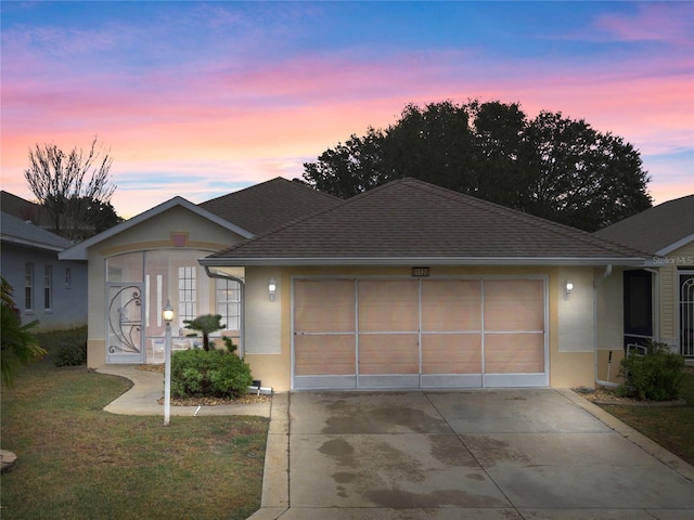 ranch-style house with a garage