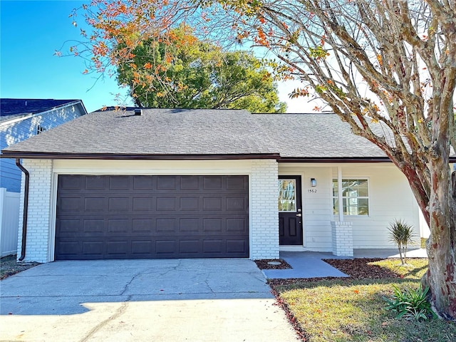 single story home with a garage