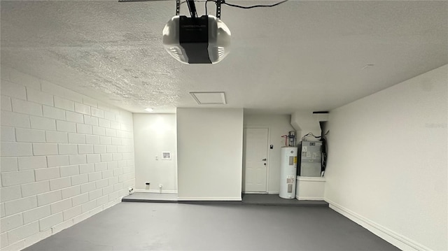 basement featuring heating unit, water heater, and a textured ceiling