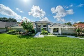 view of front facade with a front yard