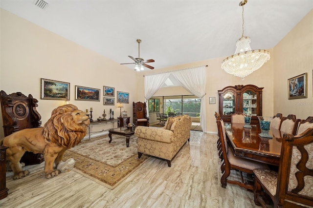 living room with ceiling fan with notable chandelier, light hardwood / wood-style flooring, and high vaulted ceiling