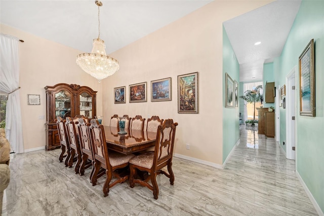 dining room with a notable chandelier