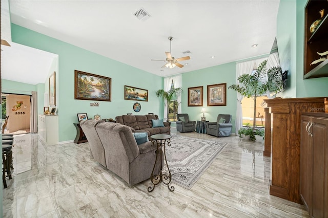 living room featuring ceiling fan