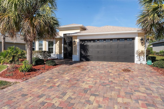 view of front of property featuring a garage