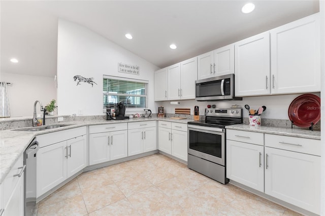 kitchen featuring sink, white cabinetry, and appliances with stainless steel finishes