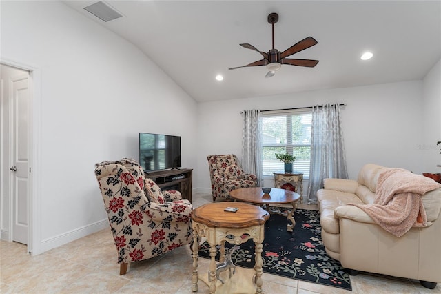 living room featuring vaulted ceiling, ceiling fan, and light tile patterned floors