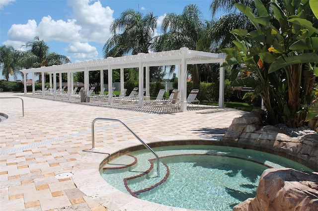 view of pool featuring a patio area and a pergola