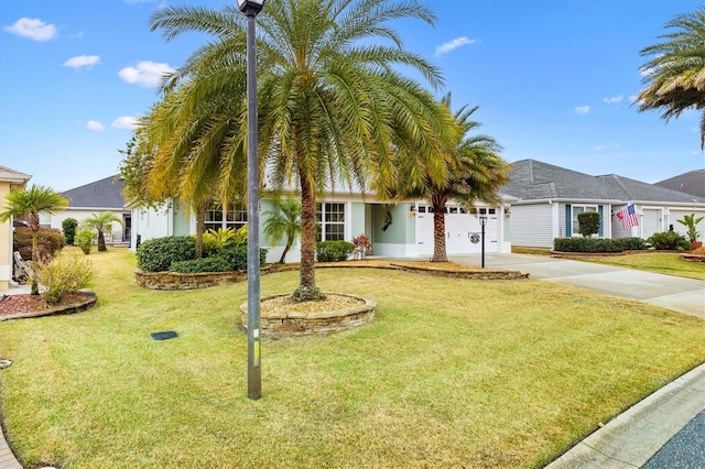 view of front facade featuring a garage and a front yard