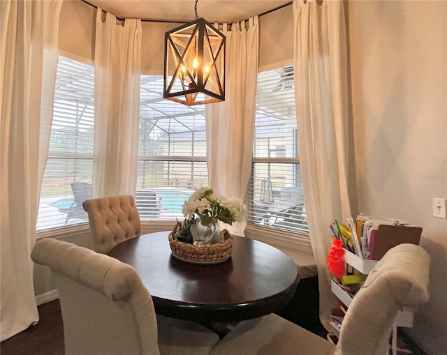 dining space featuring a chandelier