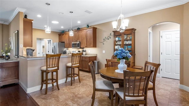 dining area featuring ornamental molding