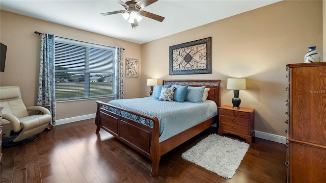 bedroom featuring dark hardwood / wood-style floors and ceiling fan