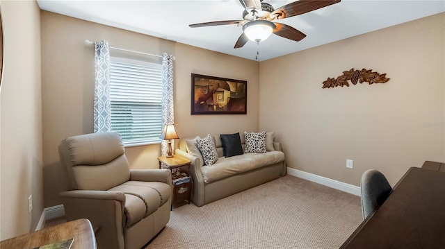 interior space featuring ceiling fan and light carpet