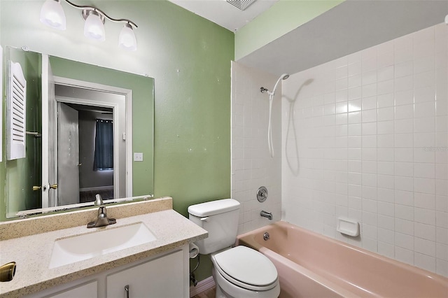 full bathroom with bathtub / shower combination, toilet, and vanity