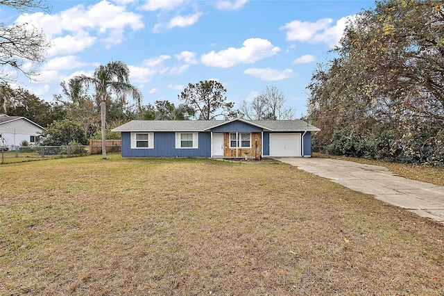 single story home featuring a garage and a front lawn