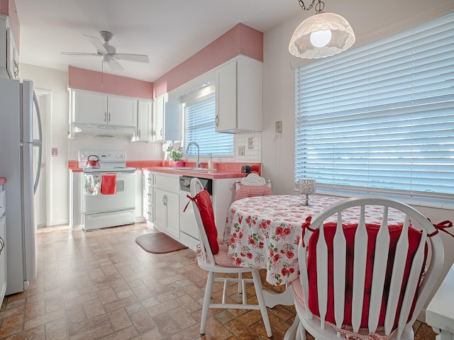 kitchen with white cabinets, stainless steel fridge, dishwasher, and electric range