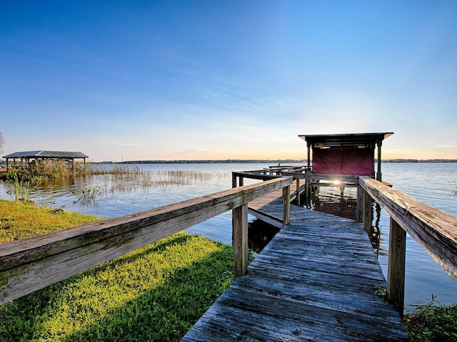 view of dock with a water view