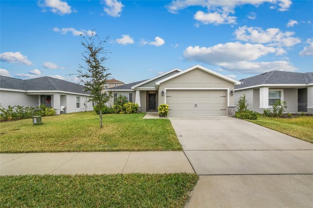 2311 Sunset Way, Davenport, FL 33837 - ranch-style home with a garage and a front yard