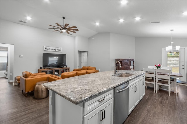 kitchen with pendant lighting, white cabinetry, dishwasher, sink, and an island with sink