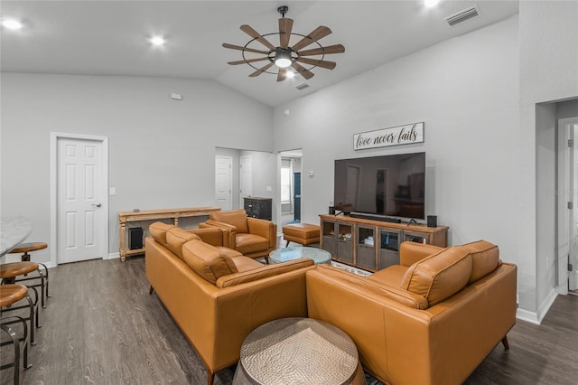 living room featuring dark wood-type flooring, high vaulted ceiling, and ceiling fan