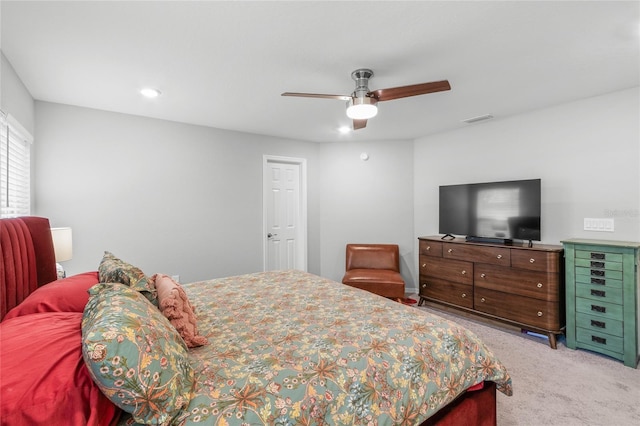 carpeted bedroom with ceiling fan