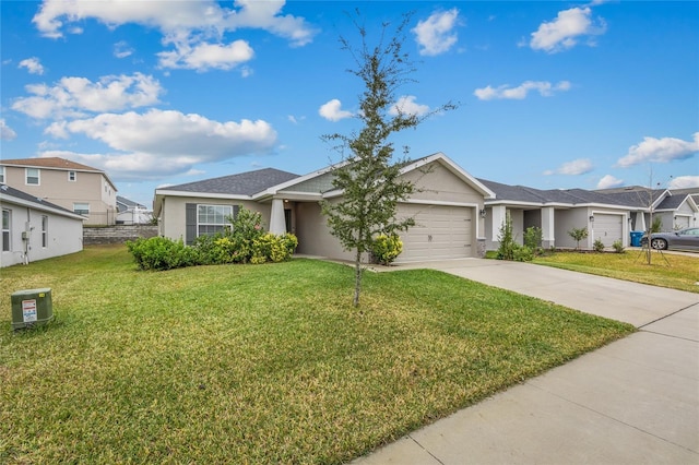 ranch-style house featuring a garage and a front lawn