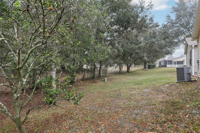 view of yard with central AC unit