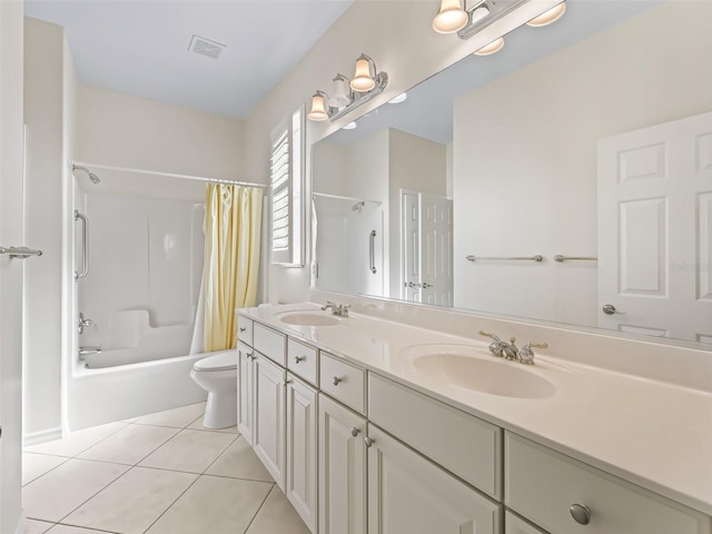 full bathroom with shower / bath combination with curtain, vanity, toilet, and tile patterned flooring