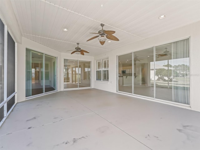 unfurnished sunroom featuring wood ceiling