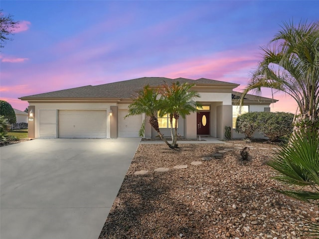 prairie-style house featuring a garage