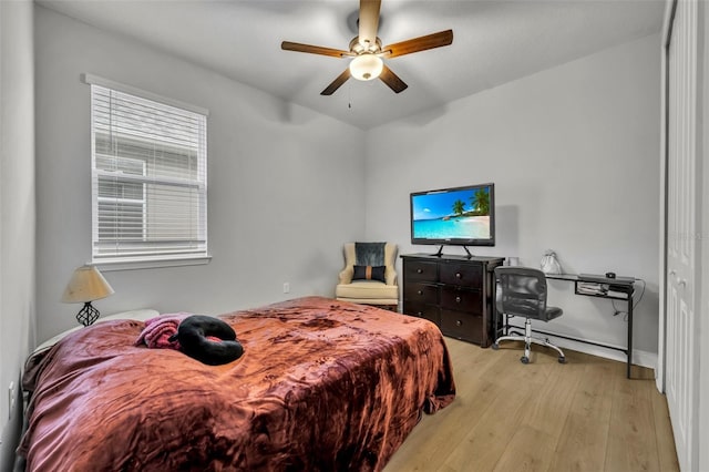 bedroom featuring ceiling fan and light hardwood / wood-style flooring