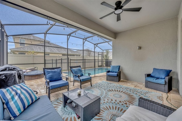 view of patio / terrace featuring a fenced in pool, a lanai, outdoor lounge area, and ceiling fan