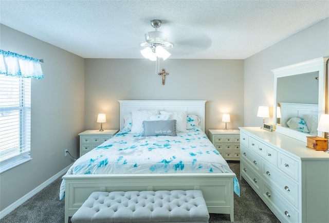 502 San Marino Dr, Lady Lake, FL 32159 - bedroom with a textured ceiling, dark carpet, and ceiling fan