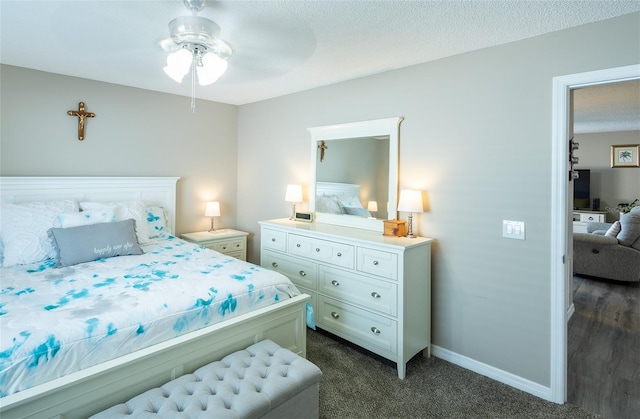 502 San Marino Dr, Lady Lake, FL 32159 - bedroom featuring a textured ceiling and dark colored carpet