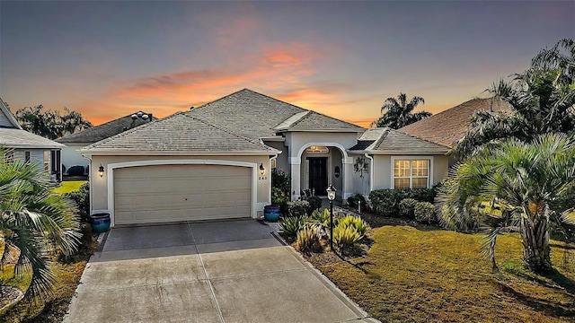 ranch-style house with a garage