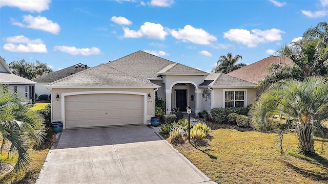 view of front of house with a garage