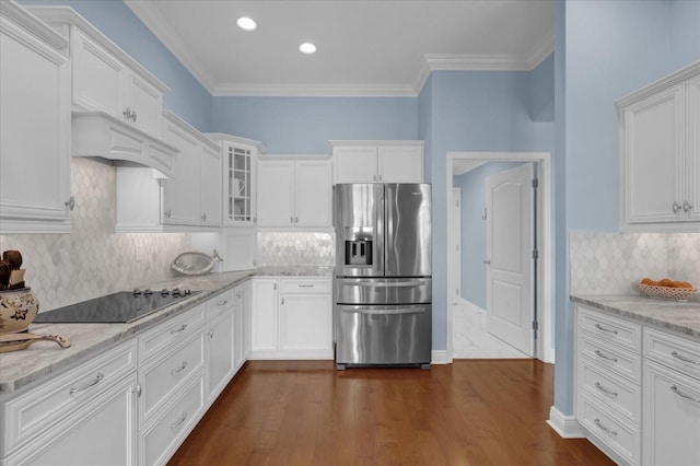 kitchen with white cabinets, black electric cooktop, glass insert cabinets, and stainless steel refrigerator with ice dispenser