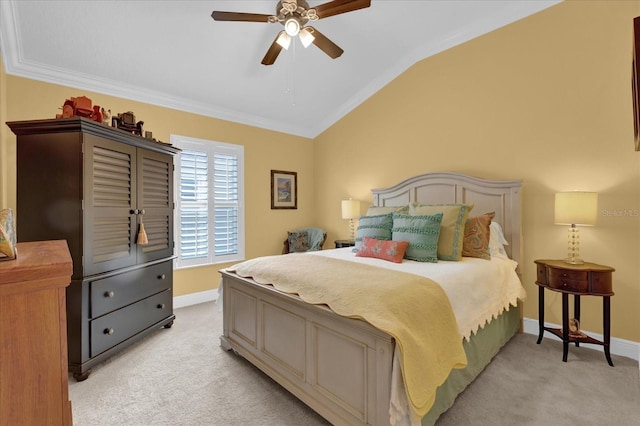 bedroom featuring vaulted ceiling, ornamental molding, light colored carpet, and ceiling fan