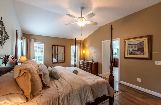 bedroom with ceiling fan, lofted ceiling, and dark hardwood / wood-style floors