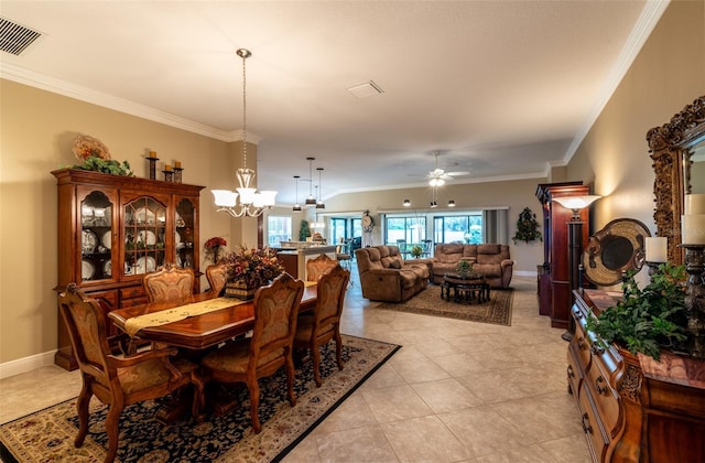 tiled dining space featuring ornamental molding and ceiling fan with notable chandelier