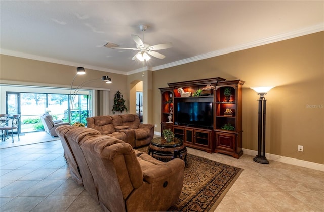 living room with ceiling fan, ornamental molding, and light tile patterned floors