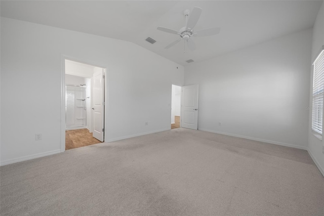 interior space featuring vaulted ceiling and ceiling fan