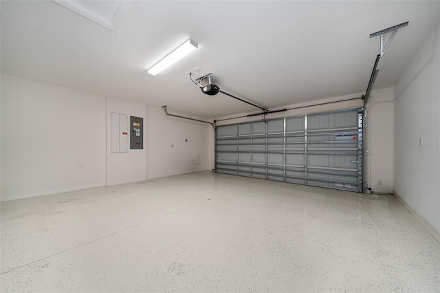 garage featuring a garage door opener and electric panel