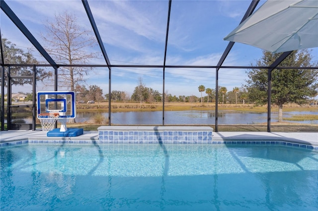 view of swimming pool with a water view and a lanai