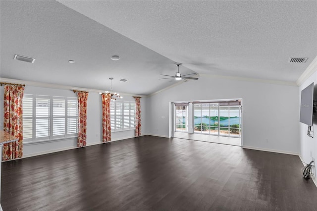 583 Arruda Ter, The Villages, FL 32162 - unfurnished living room featuring a textured ceiling, a chandelier, wood finished floors, ceiling fan, and vaulted ceiling