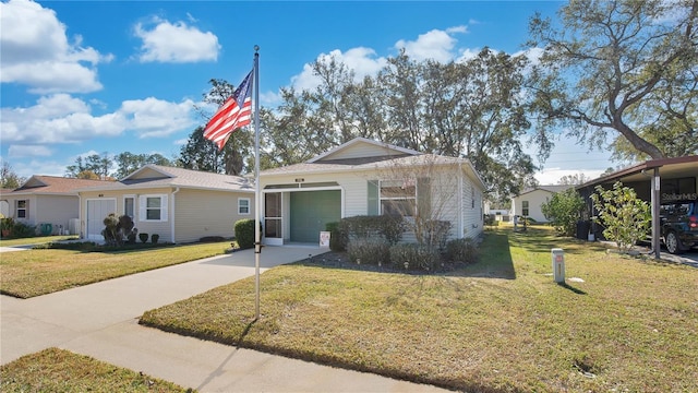 view of front of house with a garage and a front lawn