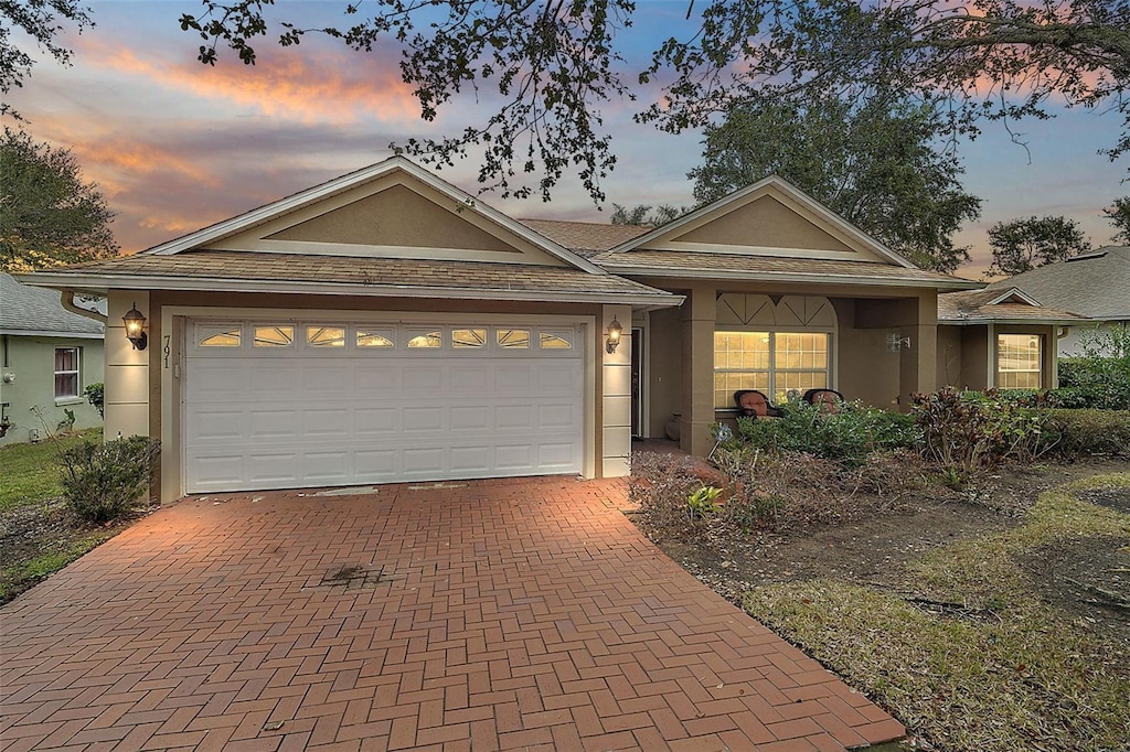 ranch-style house with a garage