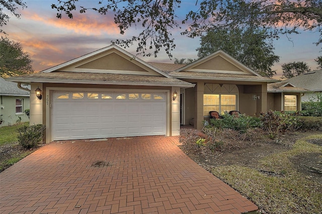 ranch-style house with a garage