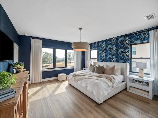 bedroom featuring hardwood / wood-style floors