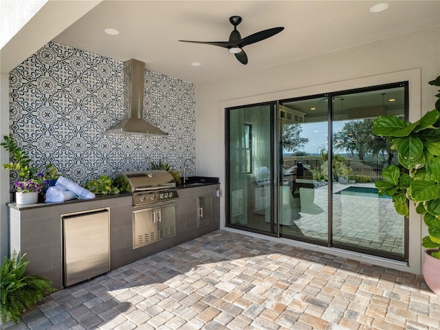 view of patio / terrace featuring ceiling fan, area for grilling, and grilling area